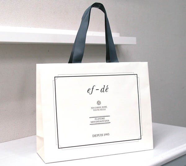 Túi kraft trắng quai băng đen