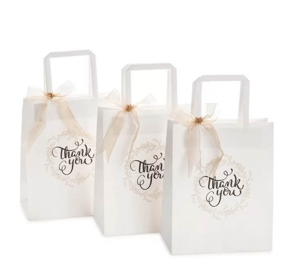 Túi giấy kraft trắng in chữ thank you với thiết kế quai buộc nơ
